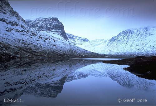 Snowy mountains with reflection, Scotland