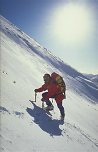 Mountaineer on snow slope, Mamores, Scotland