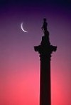 Nelson's Column at dusk with crescent-moon, London